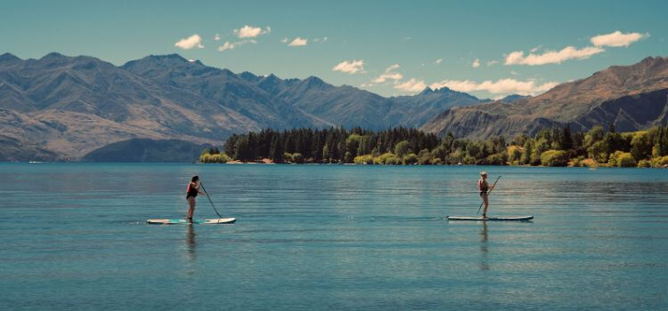 Paddle Boarding in Different Iconic Perfect Settings